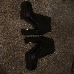 Chanel black leather platform boots